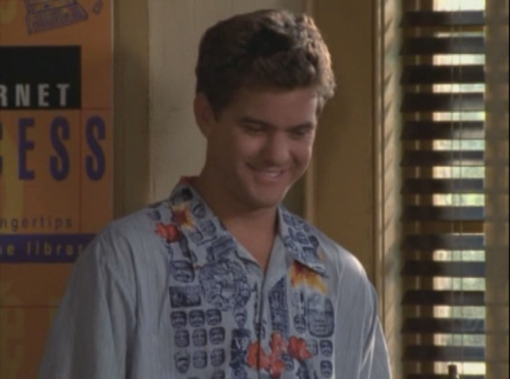 Pacey chuckles (interior, in a classroom).