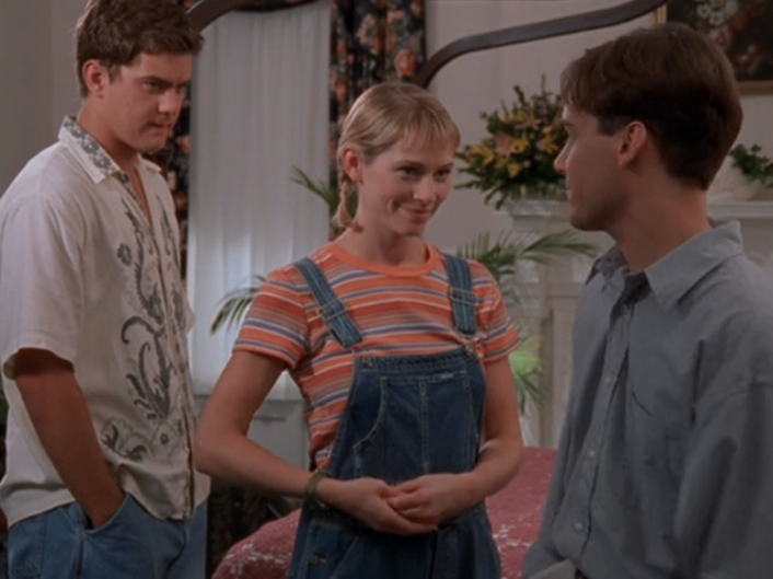 Image: Pacey looking on while Andie gives Mark a flirty look.